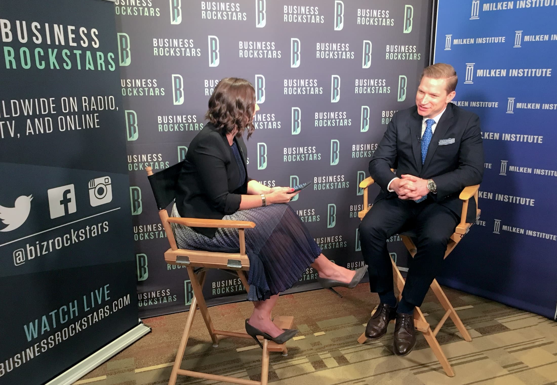 Brendan Hart seated for a moderated conversation at Milken Institute.