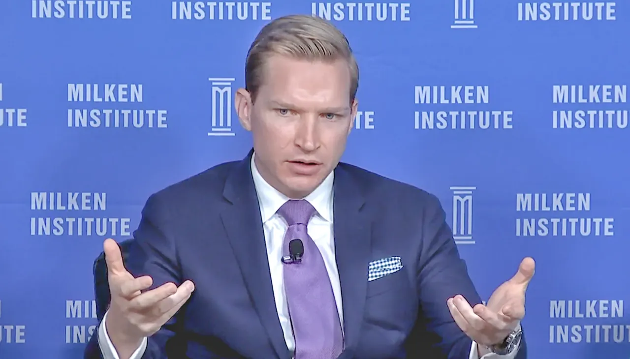 Brendan Hart speaking on a Milken Institute panel.
